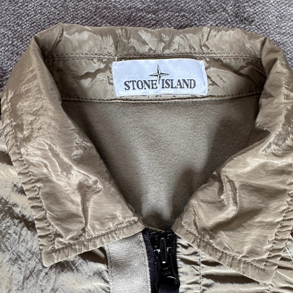 Stone Island khaki overshirt with logo patch and nylon metal cotton blend material.