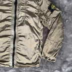 Stone Island khaki overshirt with logo patch and nylon metal cotton blend material.