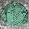 C.P. Company green overshirt with Chrome-R pocket and lens detail, brand new condition.