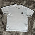 Stone Island light blue t-shirt with logo patch and crew neck design.