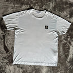Stone Island light blue t-shirt with logo patch and crew neck design.