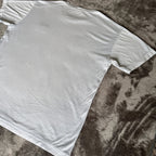Stone Island light blue t-shirt with logo patch and crew neck design.