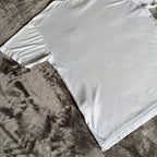 Stone Island light blue t-shirt with logo patch and crew neck design.