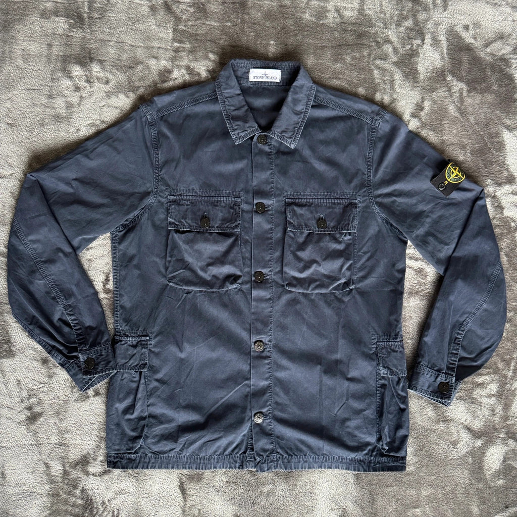 Stone Island navy overshirt with multi pockets and iconic compass logo.