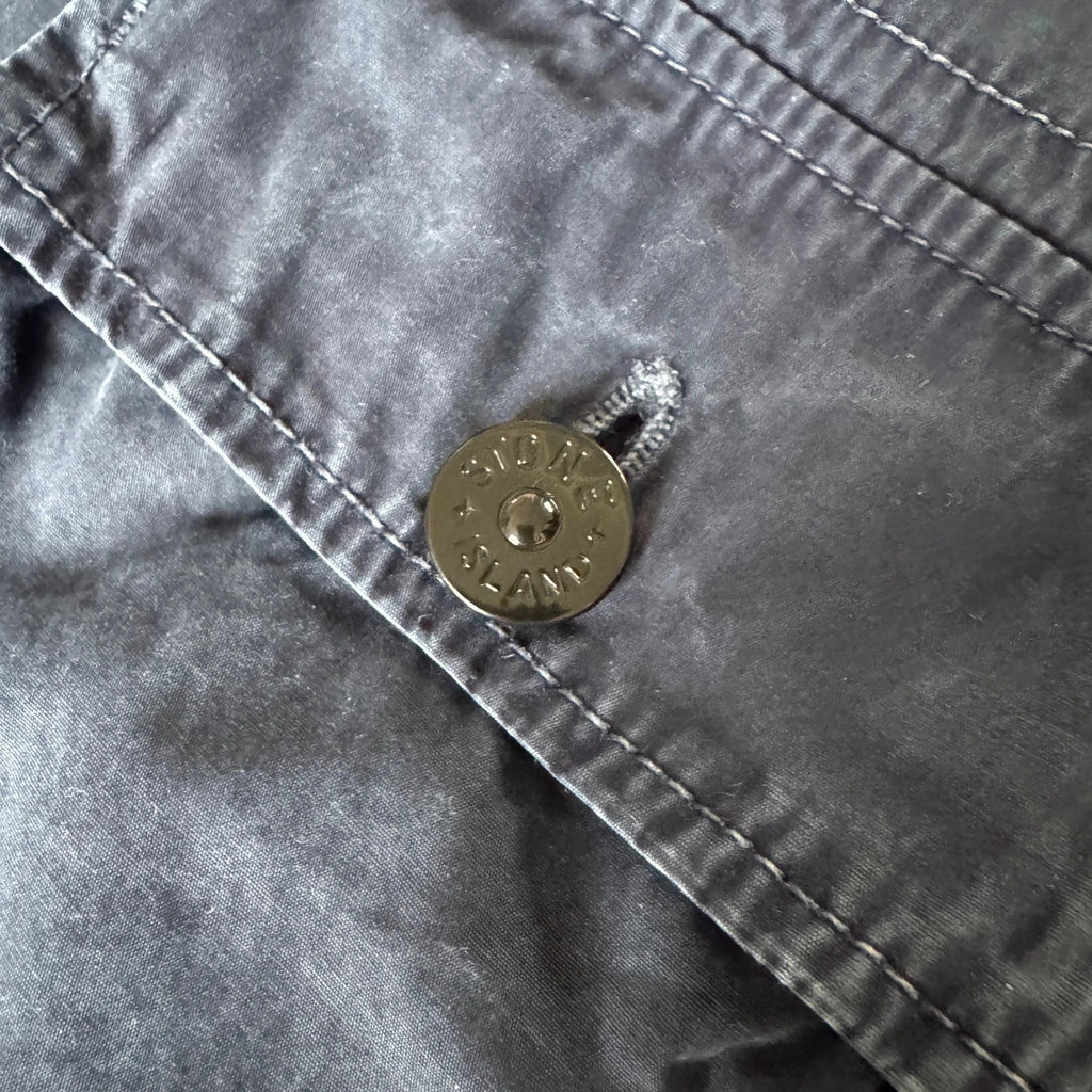 Stone Island navy overshirt with multi pockets and iconic compass logo.