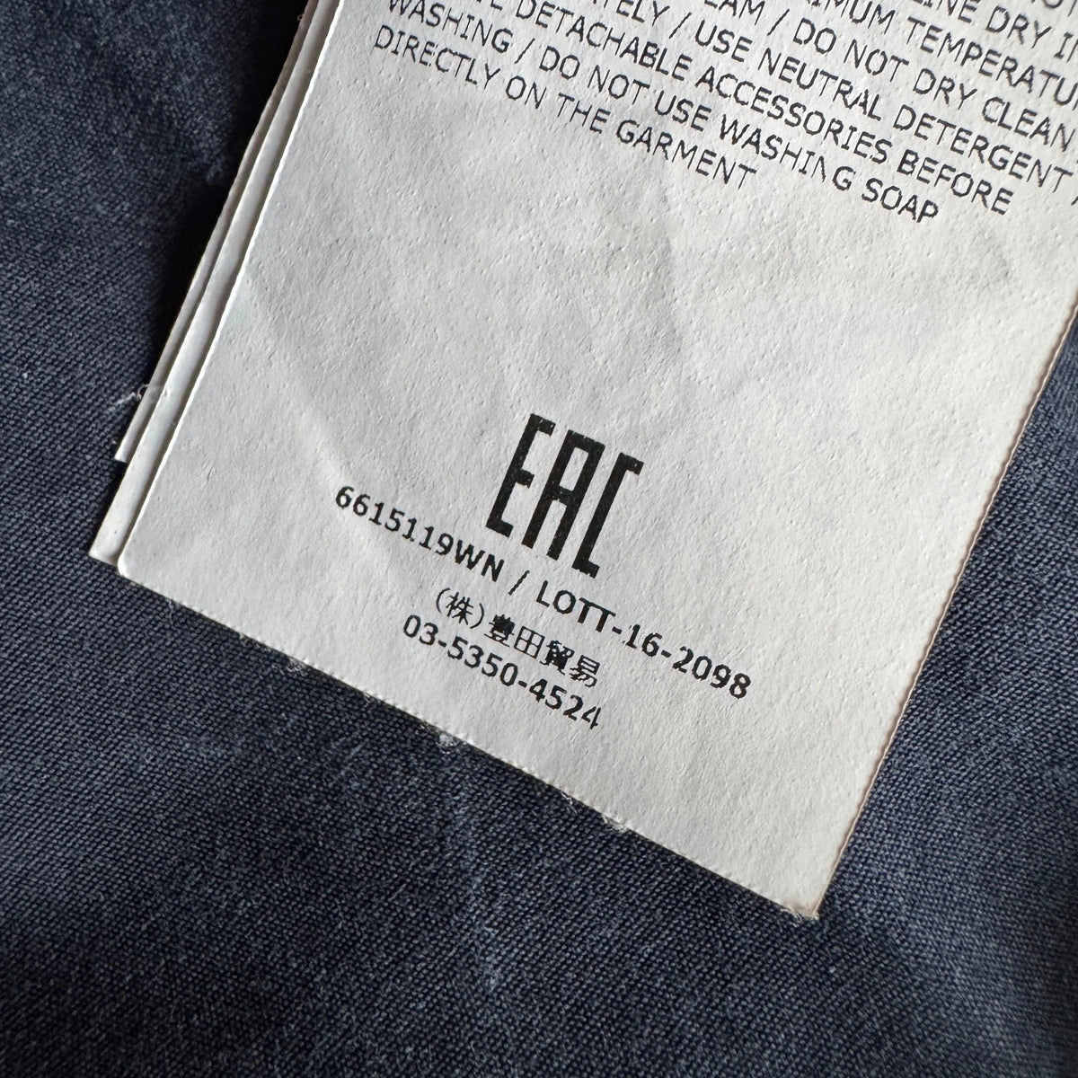 Stone Island navy overshirt with multi pockets and iconic compass logo.