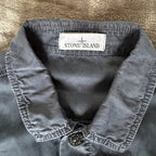 Stone Island navy overshirt with multi pockets and iconic compass logo.