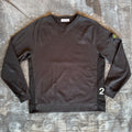 Stone Island black crewneck sweatshirt with 40th anniversary badge and logo patch.