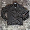 Stone Island black overshirt with logo patch and button-up front detail.