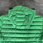 Stone Island green down jacket with logo patch and 0-cotton/R-nylon material.