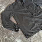Stone Island black overshirt with logo patch and button-up front detail.