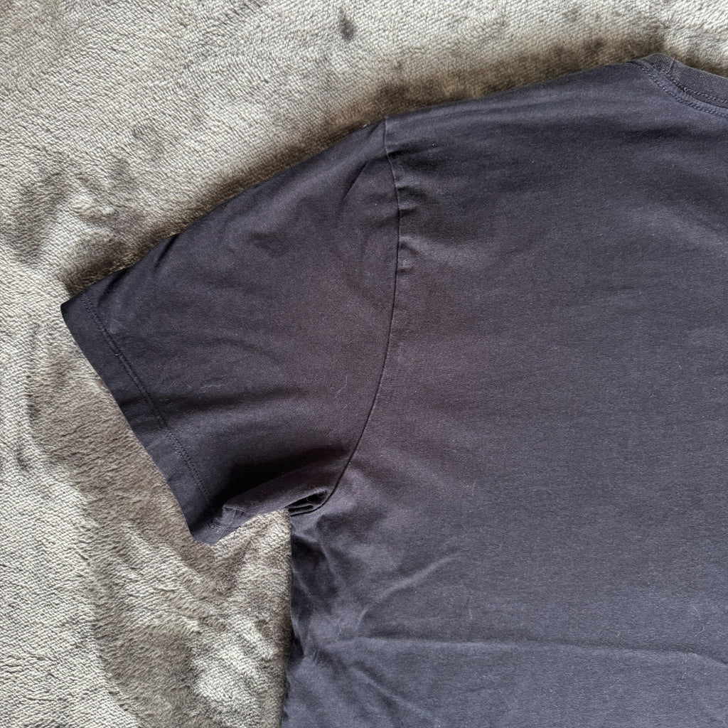 C.P. Company navy t-shirt with stamped logo and soft cotton material.