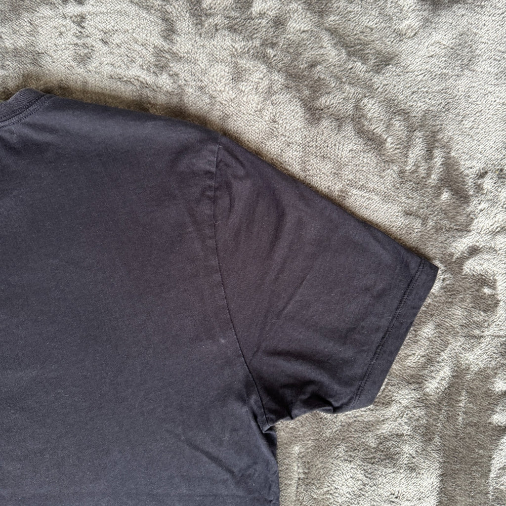 C.P. Company navy t-shirt with stamped logo and soft cotton material.