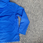 Napapijri blue anorak jacket with logo chest flap and quarter-zip front closure.
