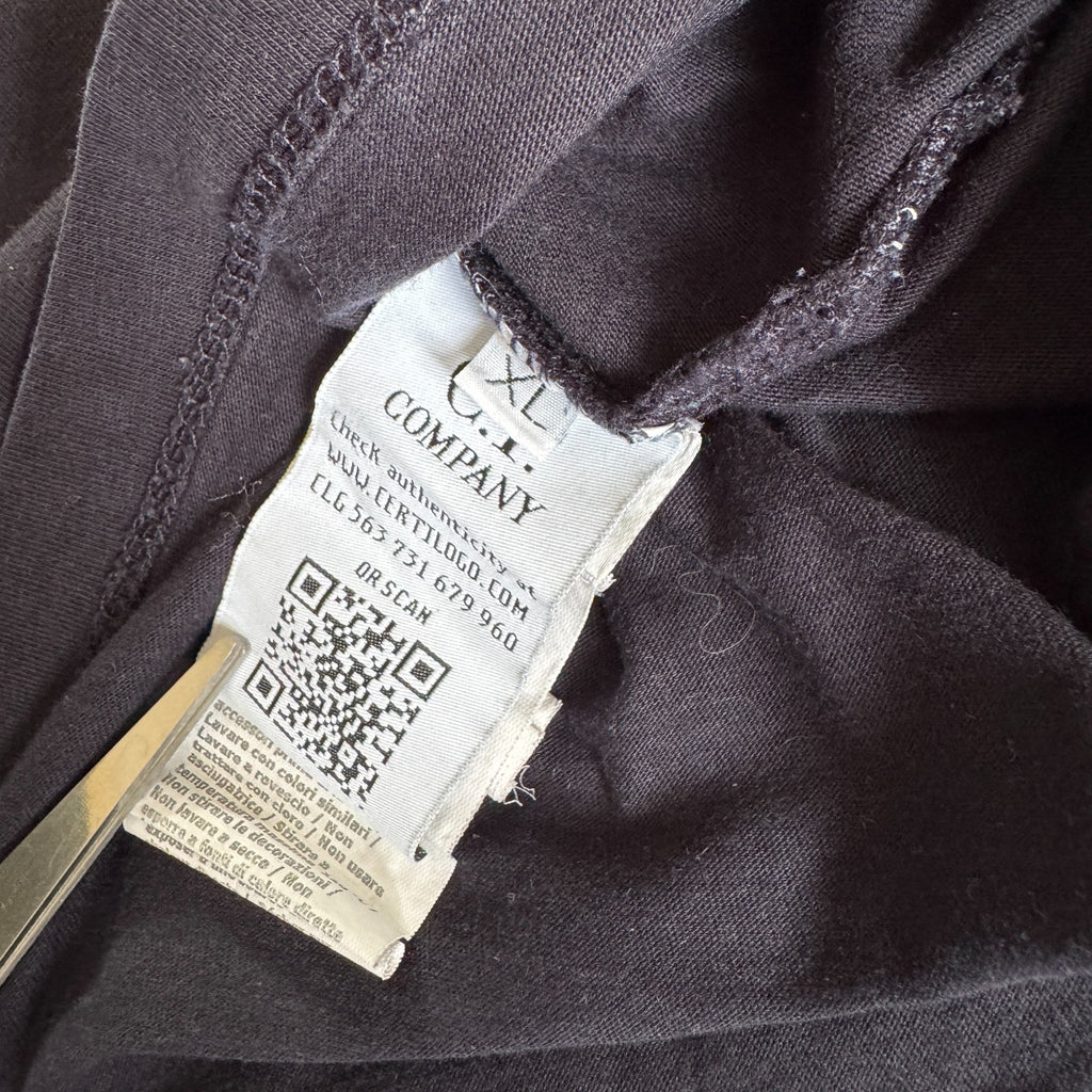 C.P. Company navy t-shirt with stamped logo and soft cotton material.
