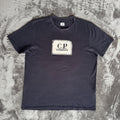 C.P. Company navy t-shirt with stamped logo and soft cotton material.
