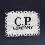 C.P. Company navy t-shirt with stamped logo and soft cotton material.