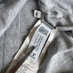 C.P. Company grey t-shirt featuring distinctive goggle print and logo detail.
