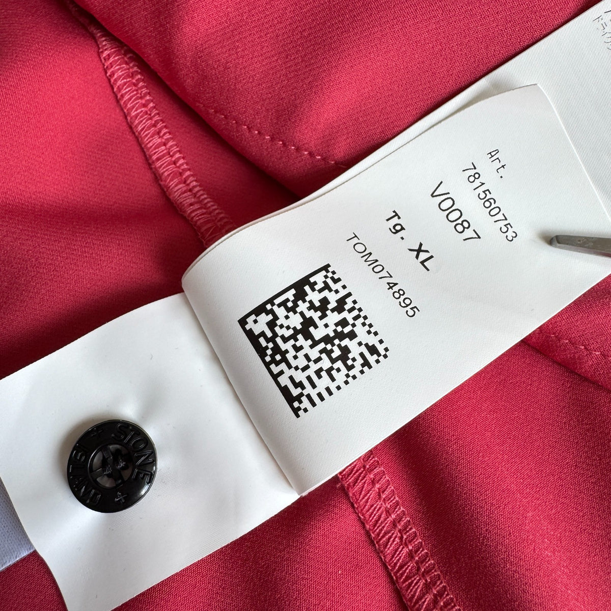Stone Island fuchsia track jacket with logo badge and stretch nylon material.